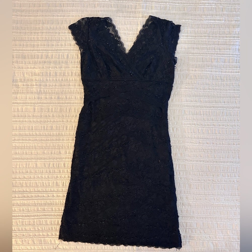 Plus size, black beaded cocktail dress.